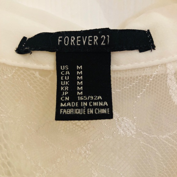 Sleeveless, collared top - Picture 4 of 4